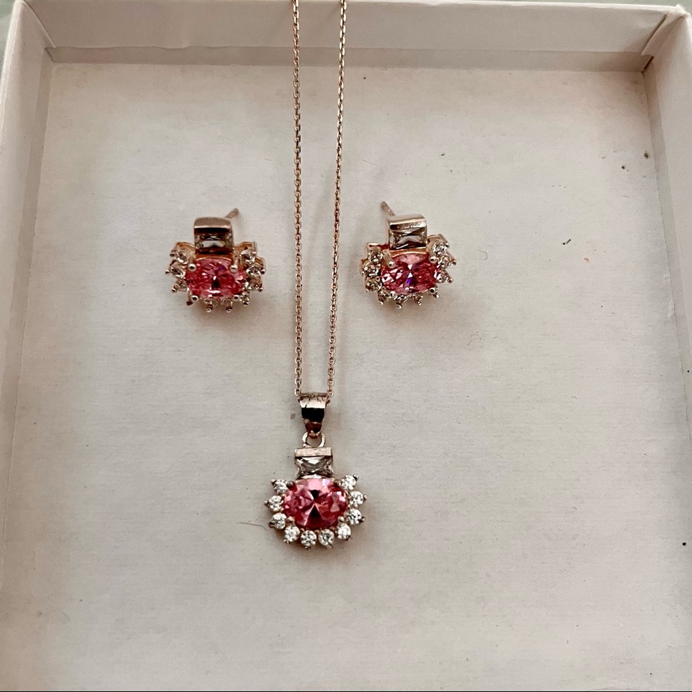 Beautiful silver and pink stone I got it in macys wore it for an event once